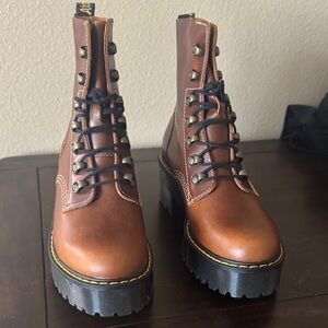 Dr. Martens brown laced up combat boots. New and never used.
